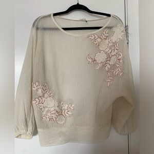 Anthropologie, sheer cream shirt with embroidered flowers